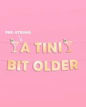 Load image into Gallery viewer, Tini Bit Older Banner - gold foil banner