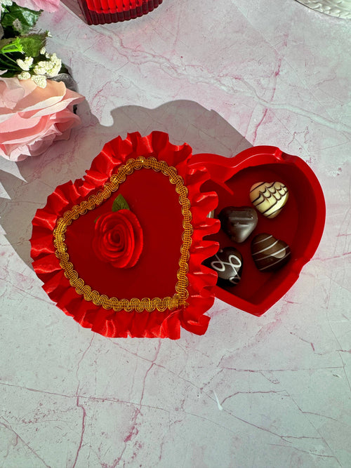 A Shop of Things Chocolate Box Ash Tray open showing chocolate shaped candies inside the tray