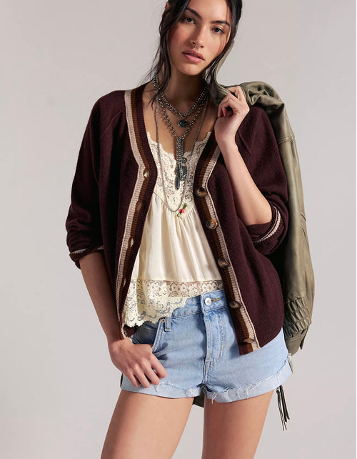 Free People Cali Cuffed Shorties in Mojave with cuffed hem worn under a cropped cardigan