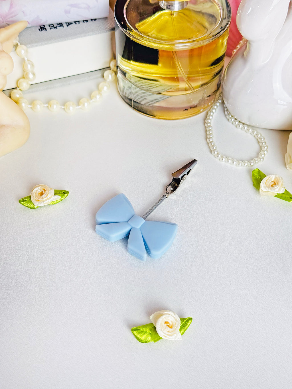 A Shop of Things bow clip accessory at Miss Behavin'