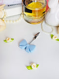 A Shop of Things bow clip accessory at Miss Behavin'