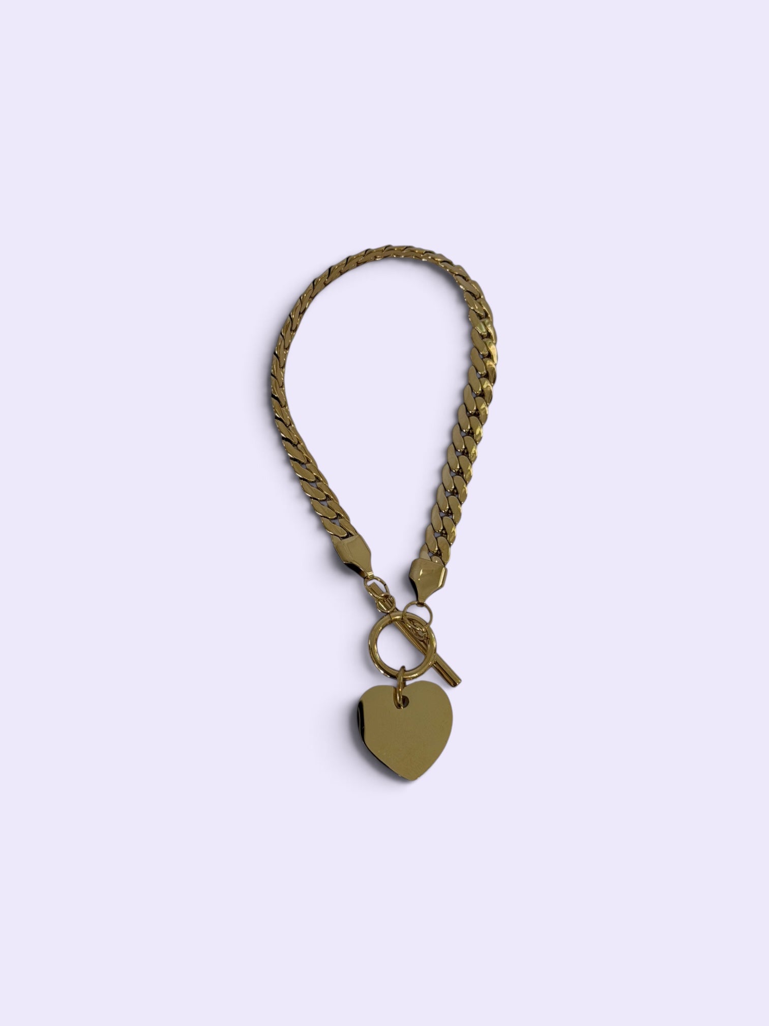 Gold heart bracelet at Miss Behavin'